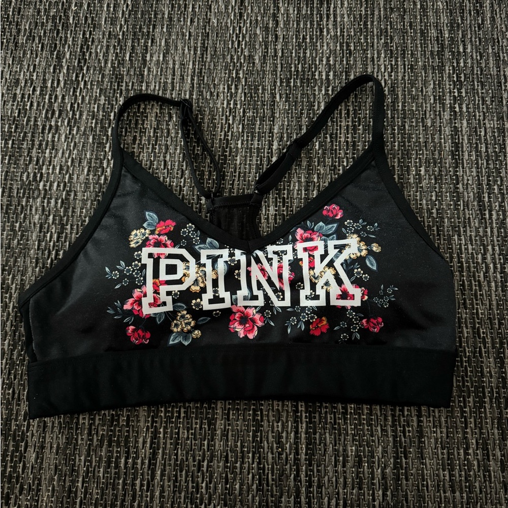 Victoria Secret Pink/ Black sports bra with floral detail on the front